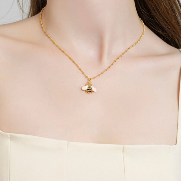 Bee_Pendant_Necklace_Styled_on_Model_s_Neck